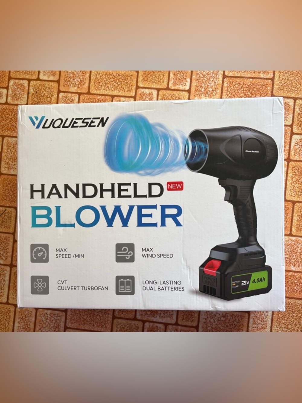 VuQuesen Handheld Blower in Black with Green Battery Accents